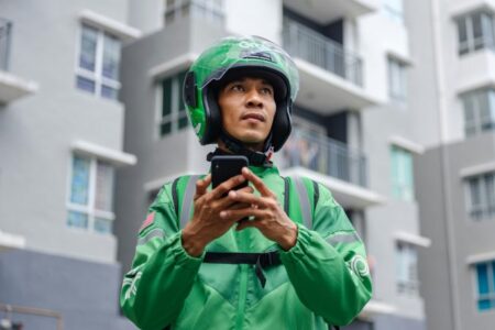 integrasi ai grab - ilustrasi berita Grab: Integrasi AI Percepat Pengembangan Produk Hingga 30% — Pengumuman Laporan…